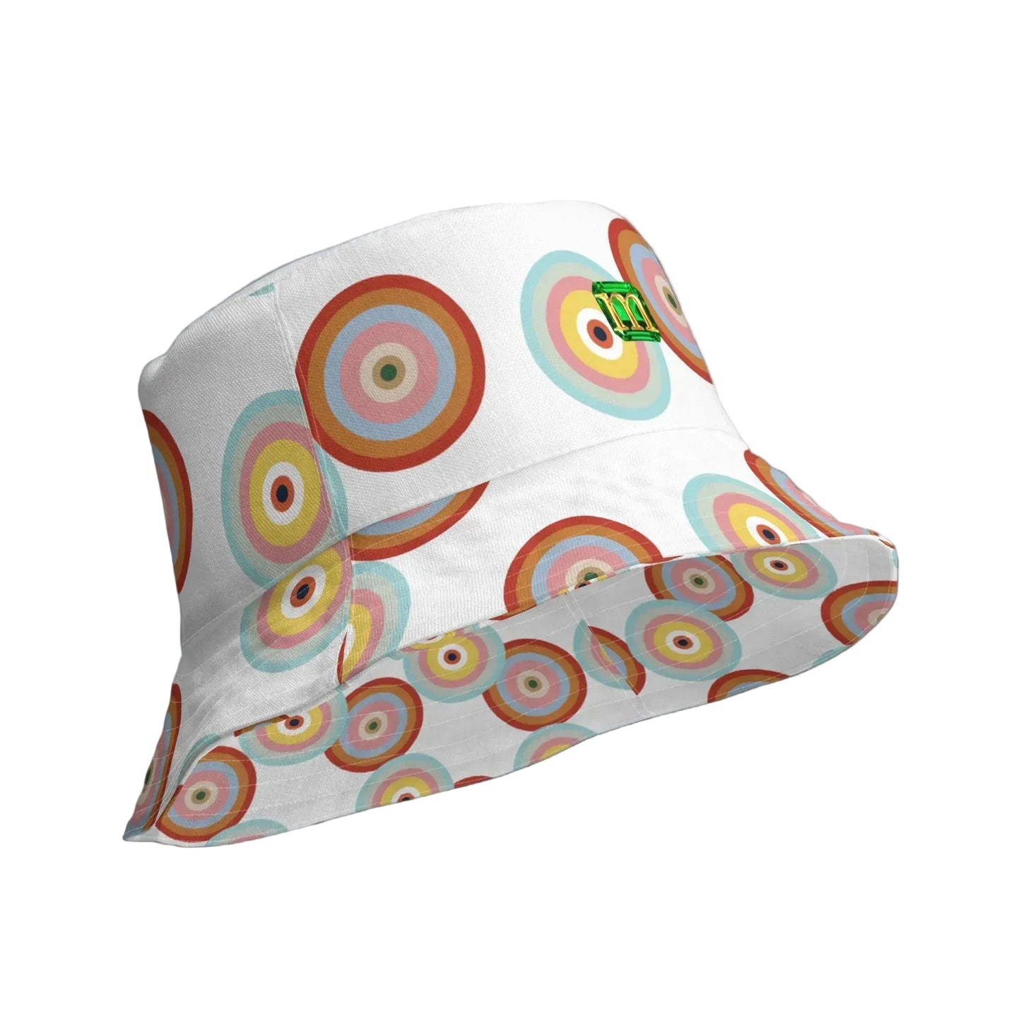 A white bucket hat featuring a colorful retro pattern of concentric circles in shades of orange, pink, yellow, green, and blue, with a small green and green logo on the side.