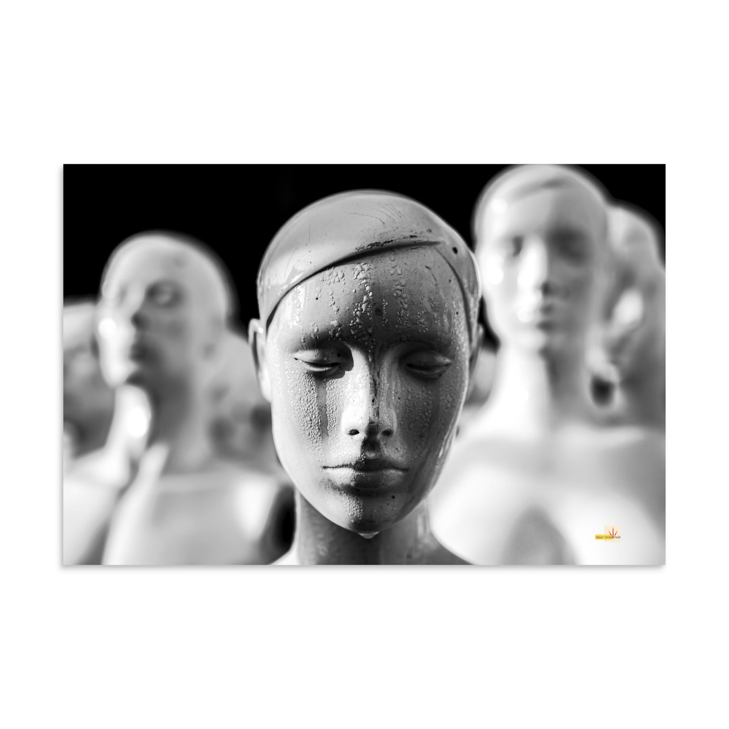 Original black and white photograph of a mannequin looking as though she is crying as the frost melts on her face.